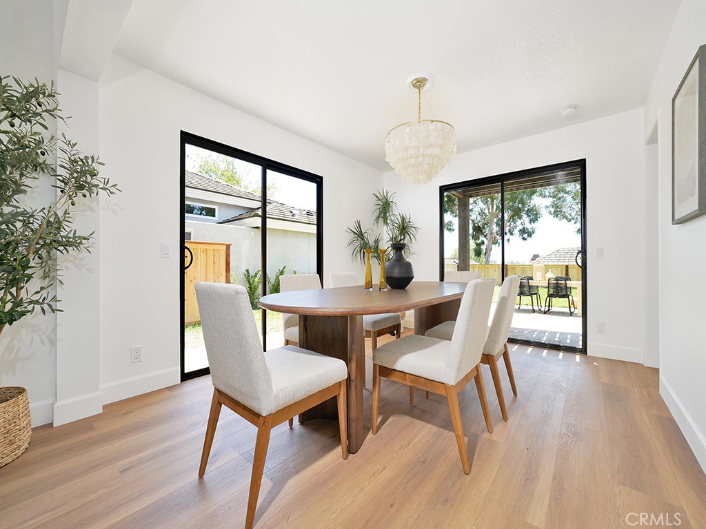 24912 Danamaple Dana Point, CA 92629 - Photo 5 of 36 a view of a dining room with furniture window and wooden floor