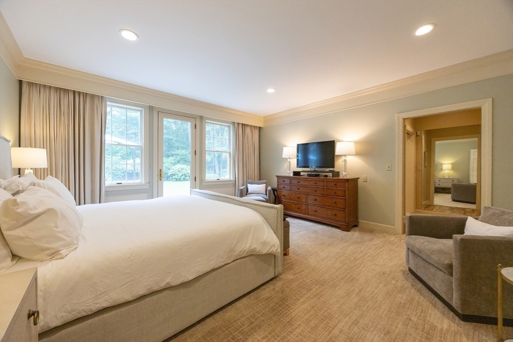 83 High Ridge Road Boxford, MA 01921 - Photo 15 of 42 a bedroom with a bed and furniture with large window