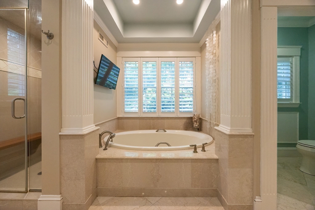 83 High Ridge Road Boxford, MA 01921 - Photo 18 of 42 a bath tub sitting next to a window