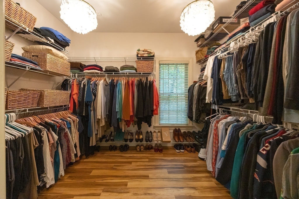 83 High Ridge Road Boxford, MA 01921 - Photo 19 of 42 a view of walk in closet with clothes and shoes