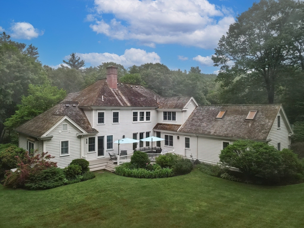 83 High Ridge Road Boxford, MA 01921 - Photo 2 of 42 a aerial view of a house next to a yard