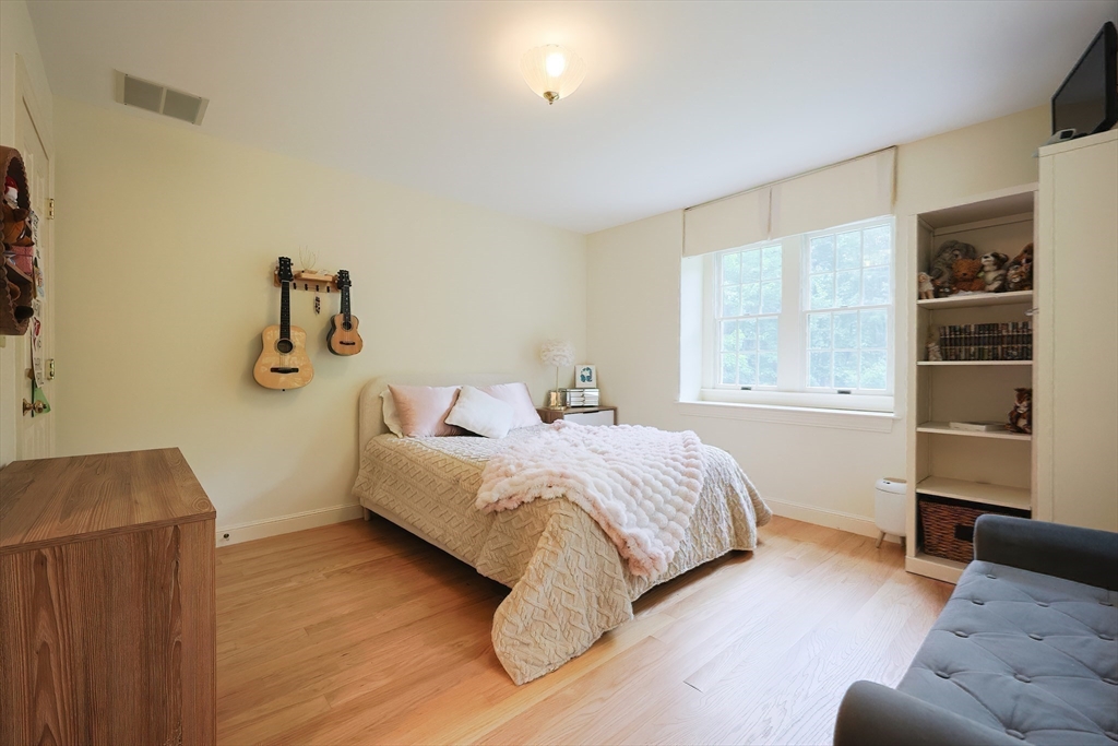 83 High Ridge Road Boxford, MA 01921 - Photo 23 of 42 a bedroom with a bed and a window