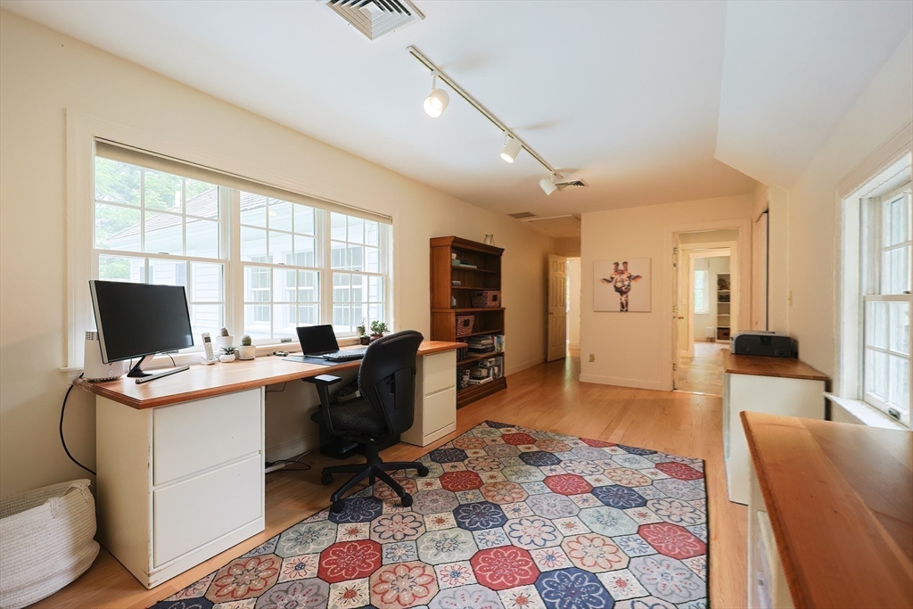 83 High Ridge Road Boxford, MA 01921 - Photo 28 of 42 a view of a workspace with furniture and a window