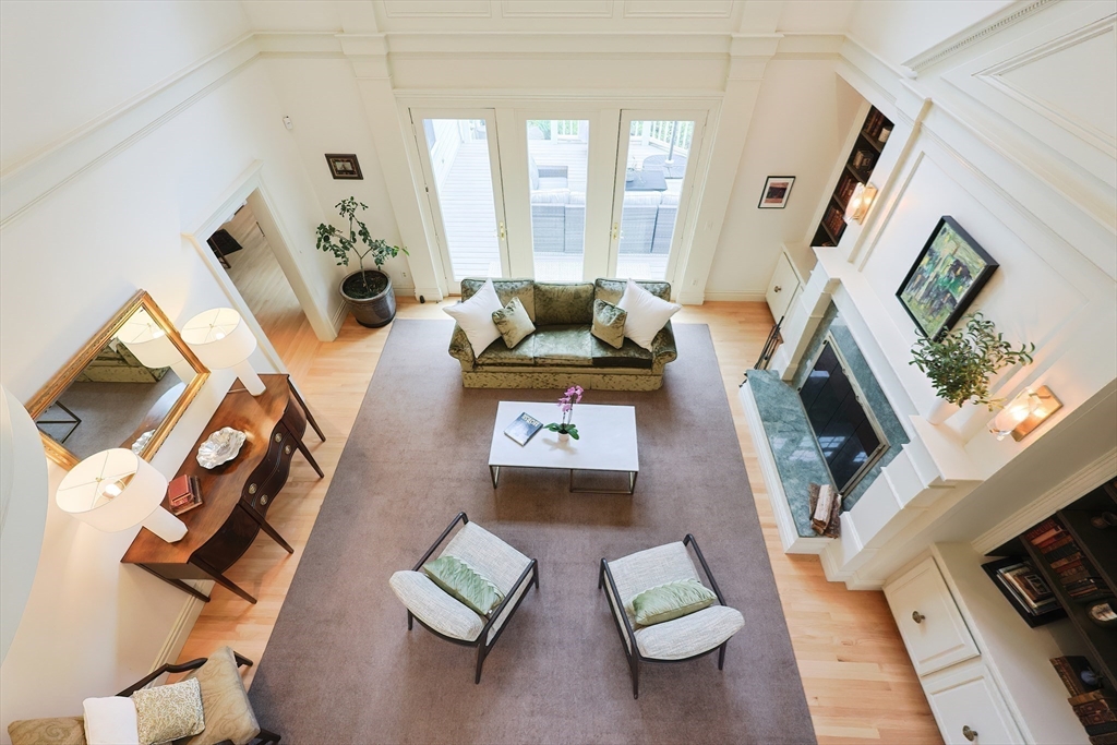 83 High Ridge Road Boxford, MA 01921 - Photo 34 of 42 a living room with furniture and a flat screen tv