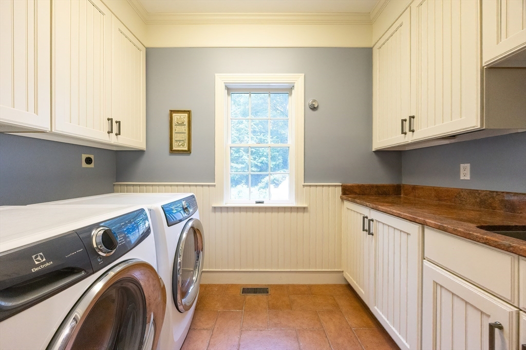 83 High Ridge Road Boxford, MA 01921 - Photo 35 of 42 a utility room with dryer and washer
