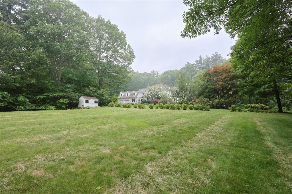 83 High Ridge Road Boxford, MA 01921 - Photo 38 of 42 a view of a field with trees in the background