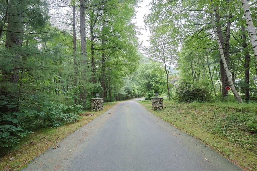 83 High Ridge Road Boxford, MA 01921 - Photo 40 of 42 a view of a road with trees in the background