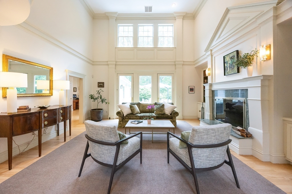 83 High Ridge Road Boxford, MA 01921 - Photo 5 of 42 a living room with furniture and a fireplace