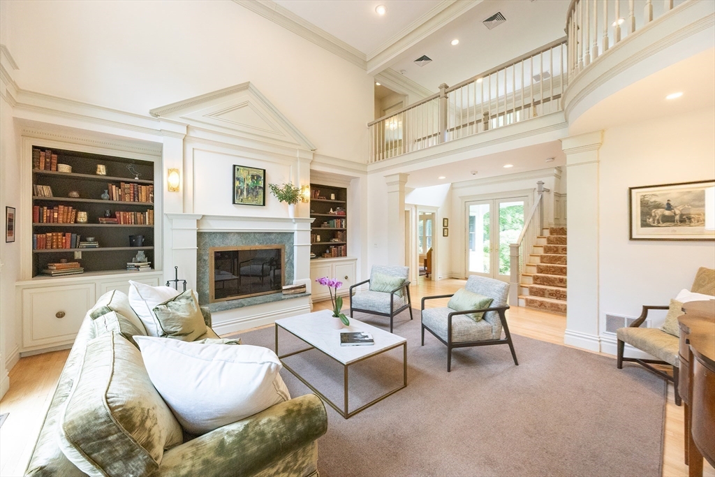 83 High Ridge Road Boxford, MA 01921 - Photo 6 of 42 a living room with furniture and a fireplace