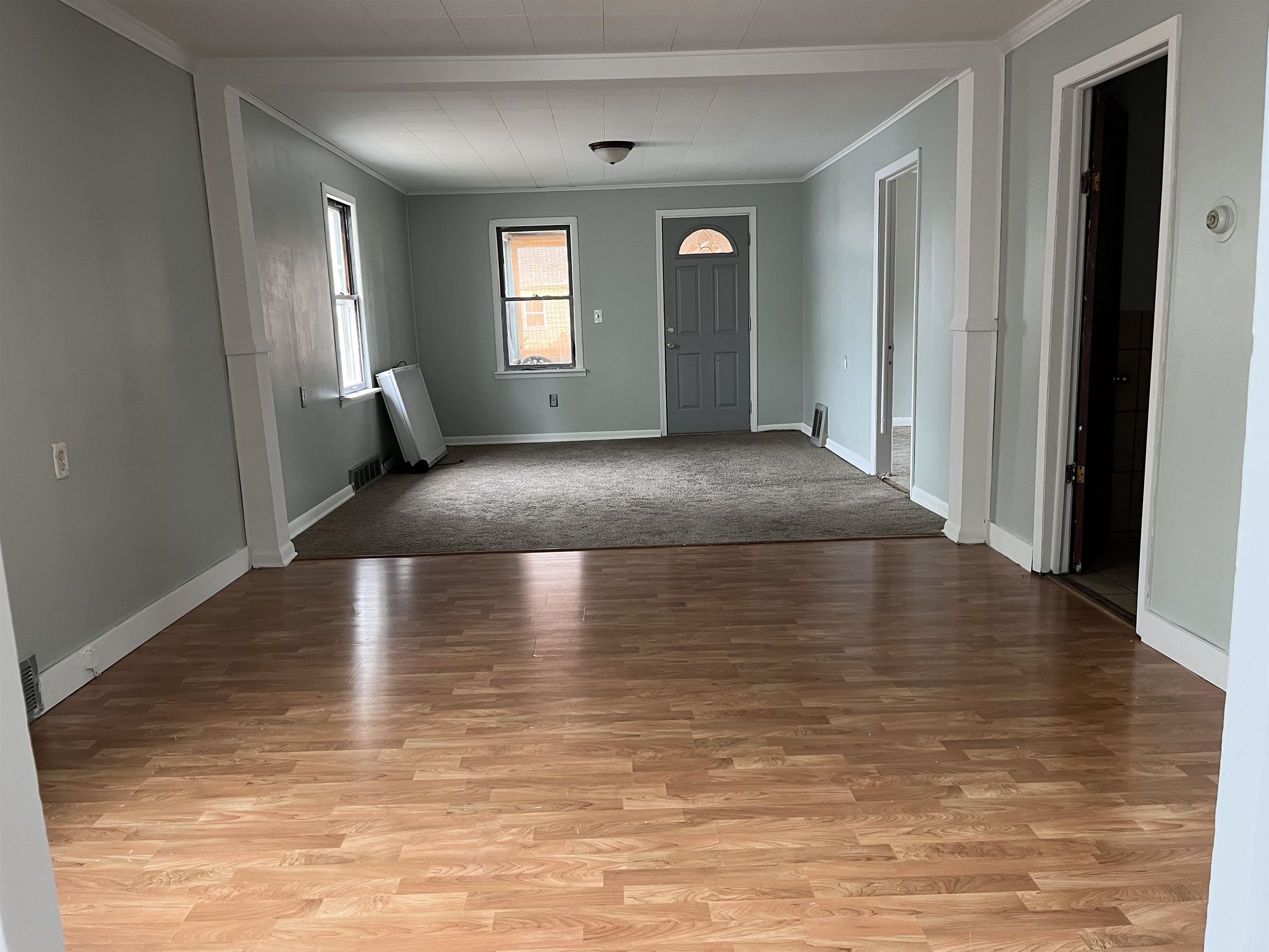 415 Barnum Road Rockford, IL 61109 - Photo 5 of 24 a view of a livingroom with wooden floor