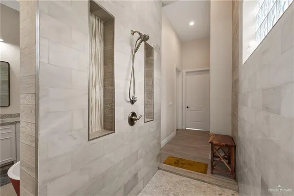 a bathroom with a white toilet