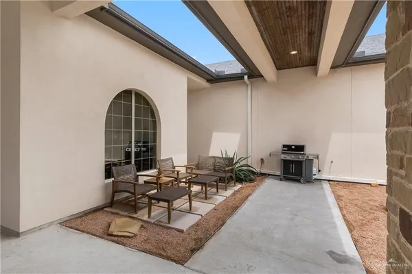 a view of a garden with an outdoor space