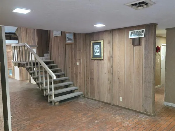 a view of entryway with stairs