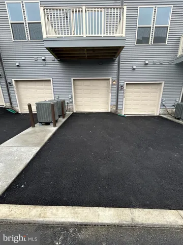 a view of a house with a garage