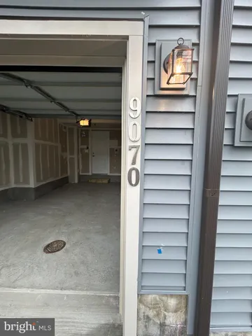 a front view of a house with a porch