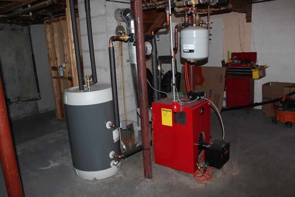 58 Corey Hill Road Ashburnham, MA 01430 - Photo 9 of 13 a view of a room with gym equipment
