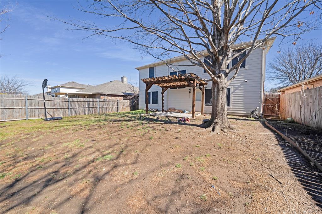 13241 Ridgepointe Road Fort Worth, TX 76244 - Photo 29 of 31 a view of a house with a snow in the yard