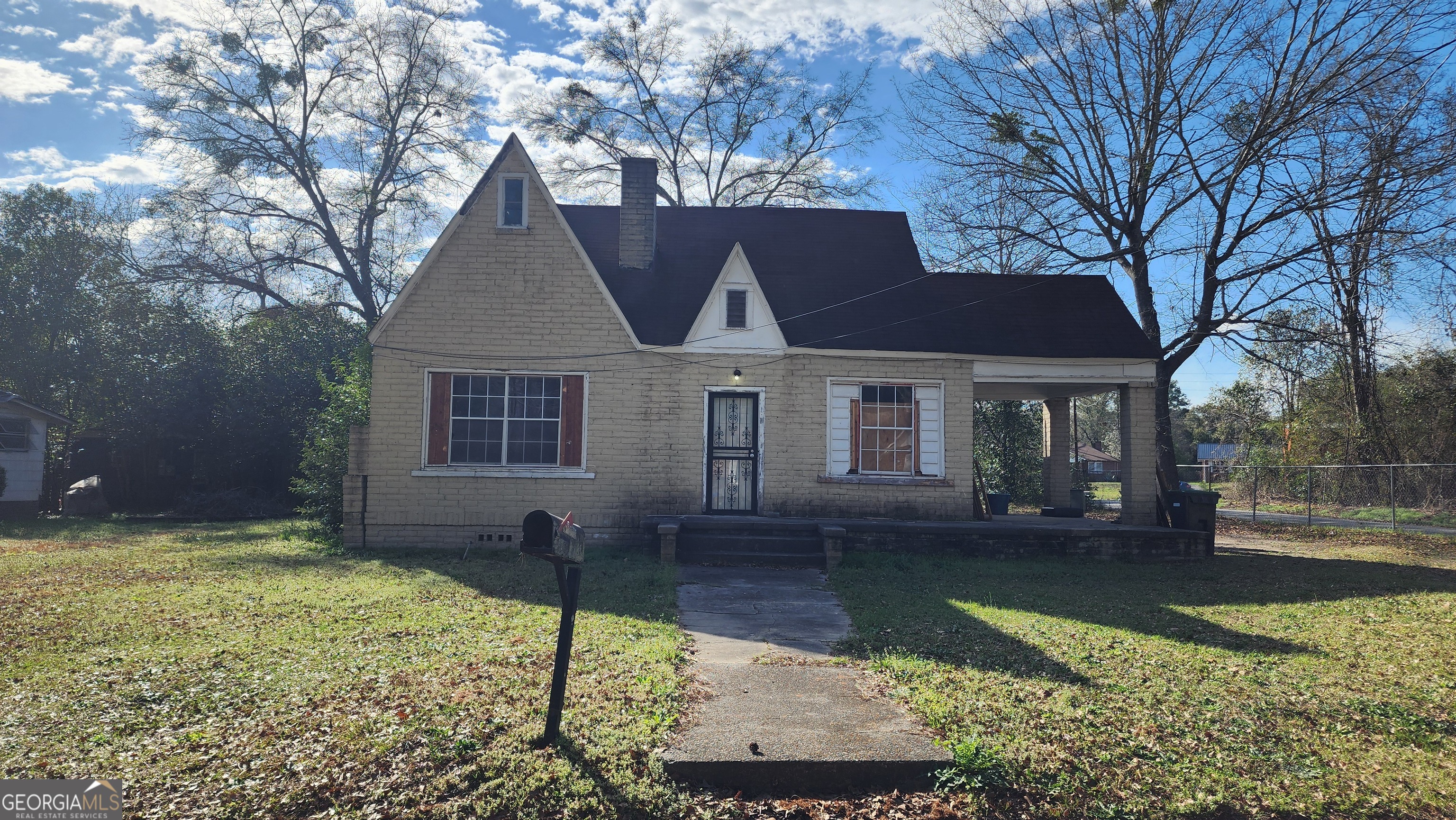 896 Roseview Drive Macon, GA 31217 - Photo 1 of 1 a front view of a house with a yard