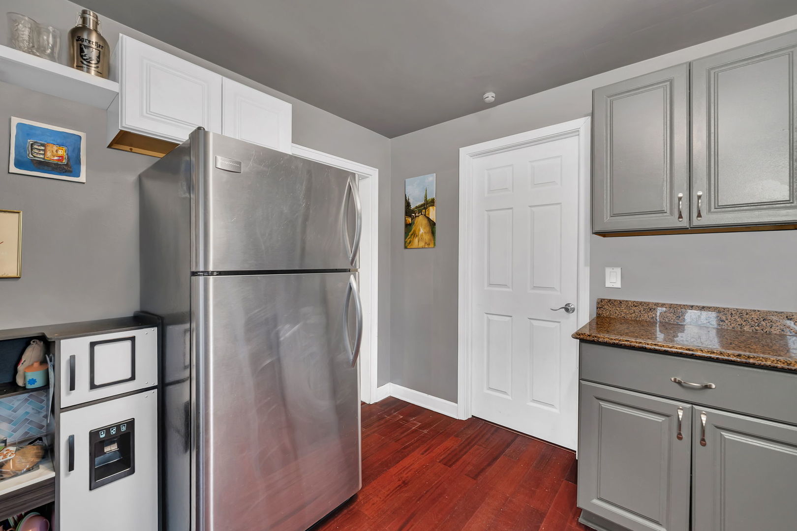 136 Grove Street Braidwood, IL 60408 - Photo 13 of 26 a kitchen with stainless steel appliances granite countertop a refrigerator and a sink