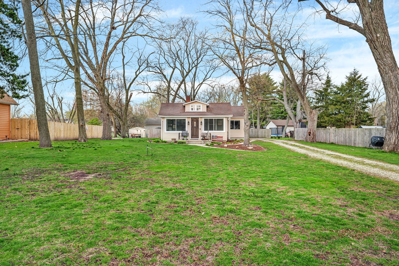 136 Grove Street Braidwood, IL 60408 - Photo 26 of 26 a view of a house with a yard deck and sitting area
