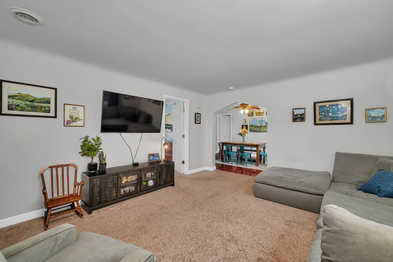 136 Grove Street Braidwood, IL 60408 - Photo 6 of 26 a living room with furniture and a flat screen tv