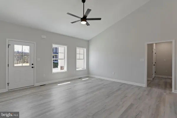 a view of a room with racks on the wall