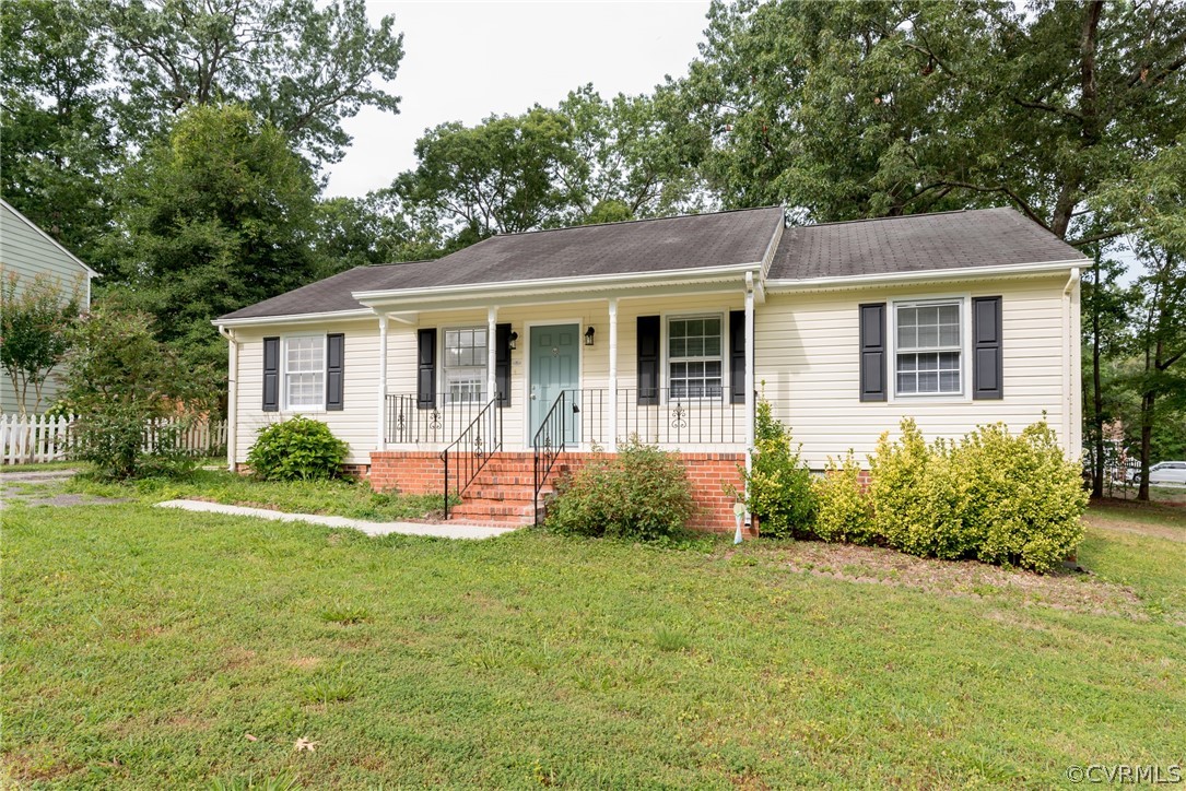 front view of a house that has a yard