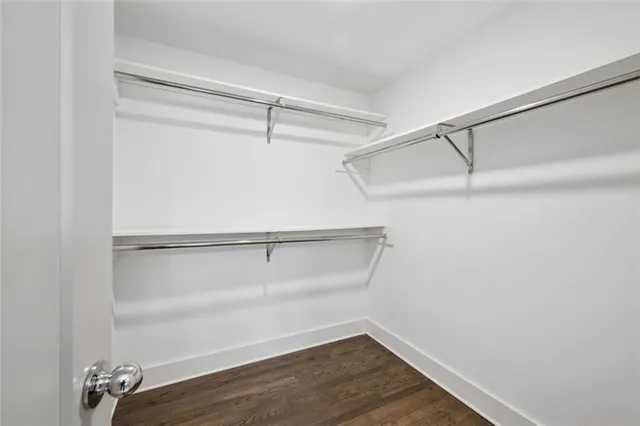 a view of an empty walk in closet