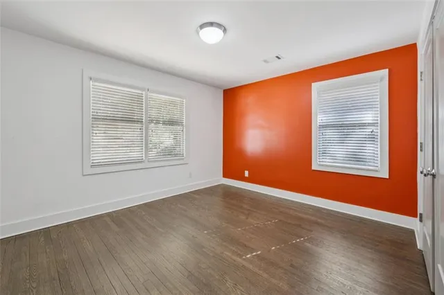 an empty room with windows