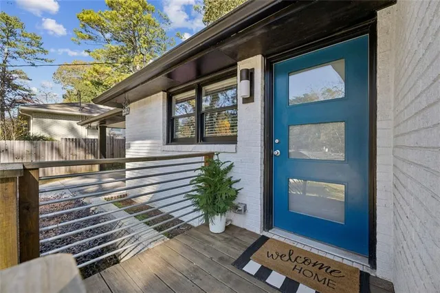 a view of a house with a street
