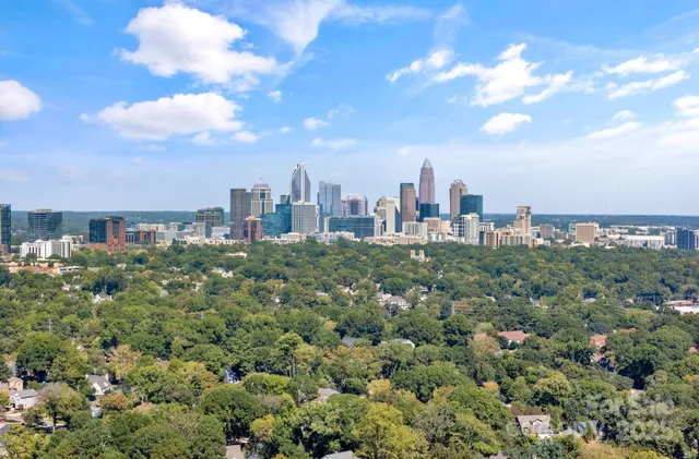 a view of a city with tall buildings