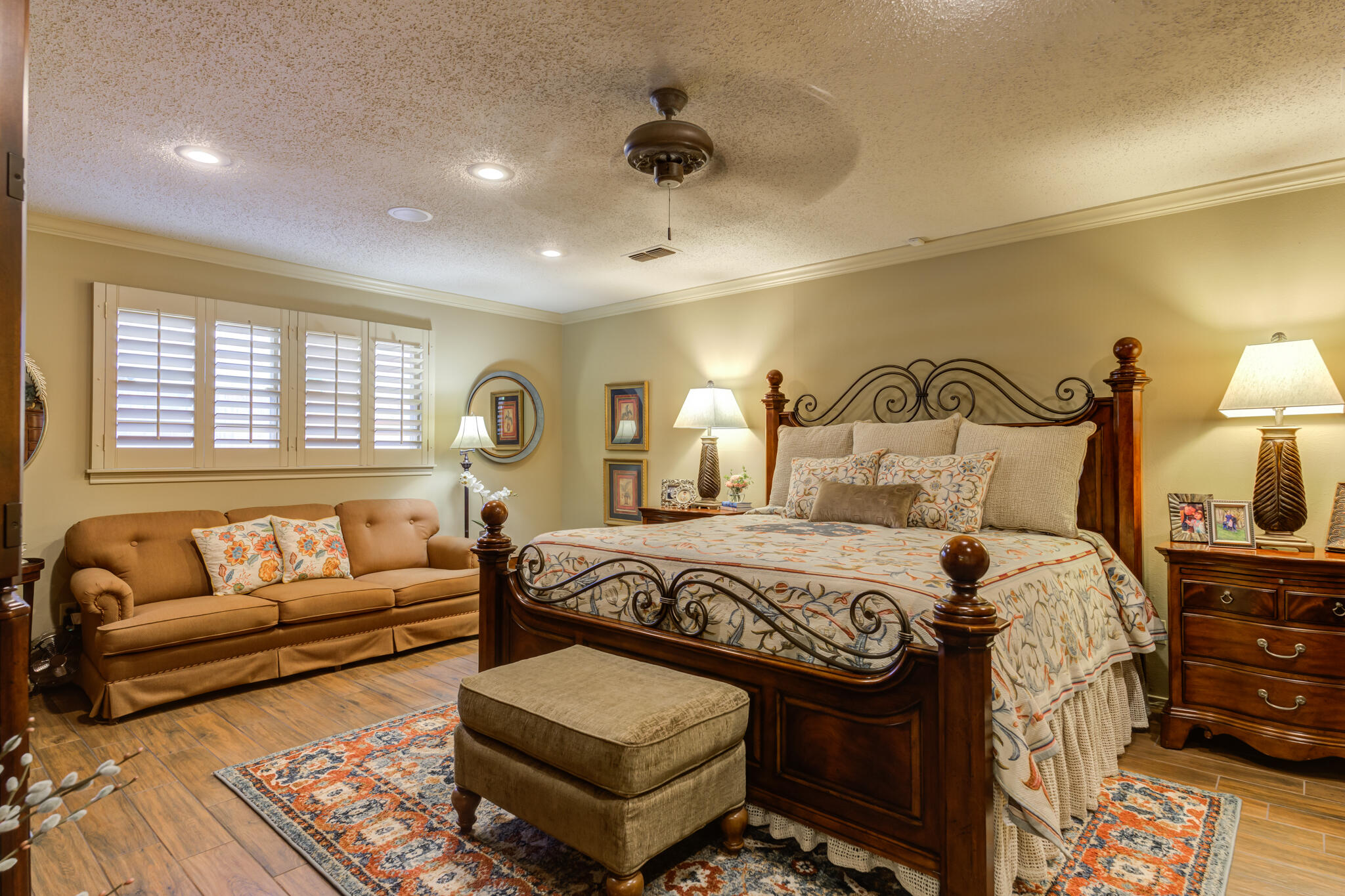 3614 68th Street Lubbock, TX 79413 - Photo 36 of 68 a bedroom with a bed a couch and dresser