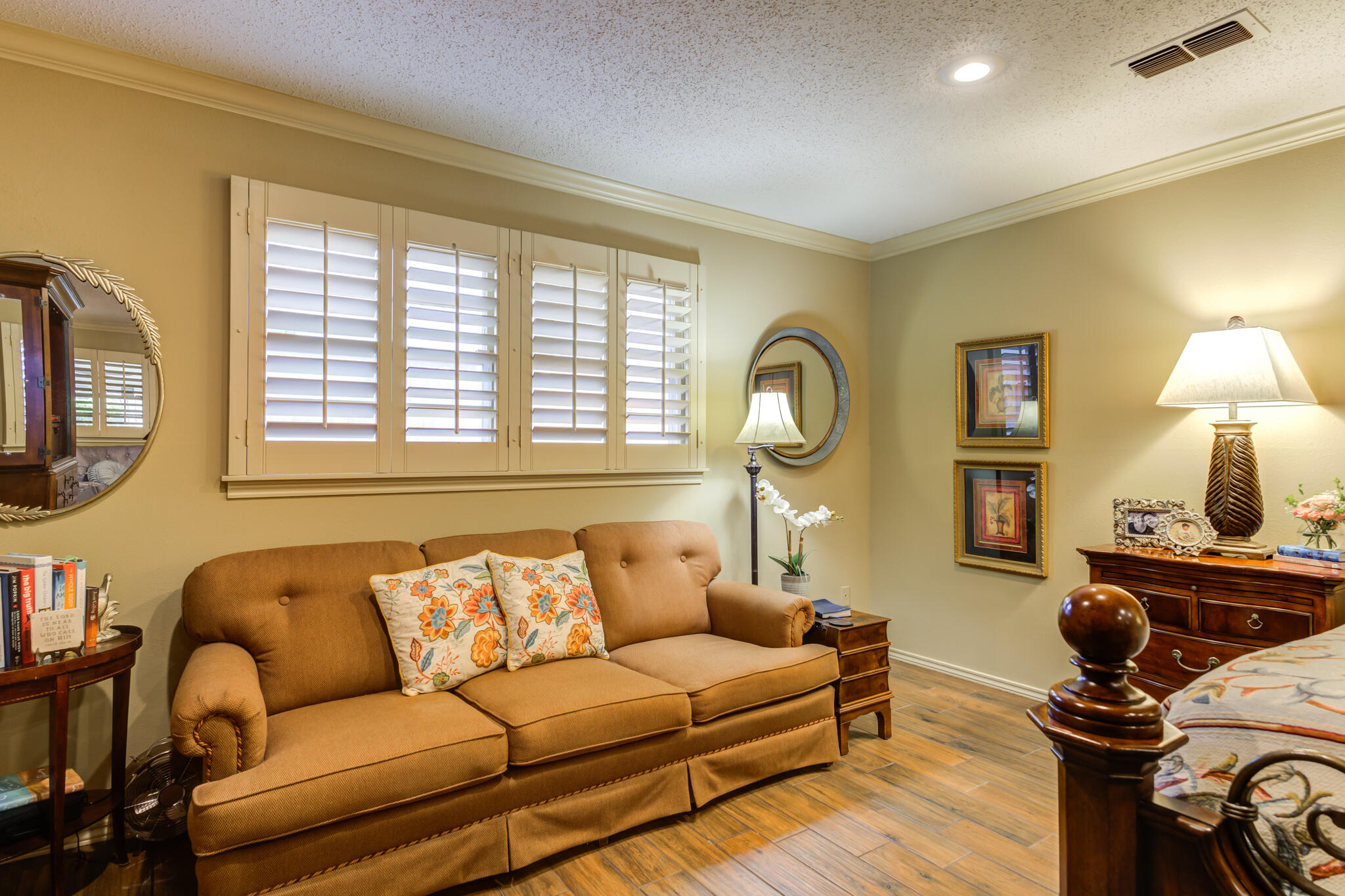3614 68th Street Lubbock, TX 79413 - Photo 37 of 68 a living room with furniture and a flat screen tv