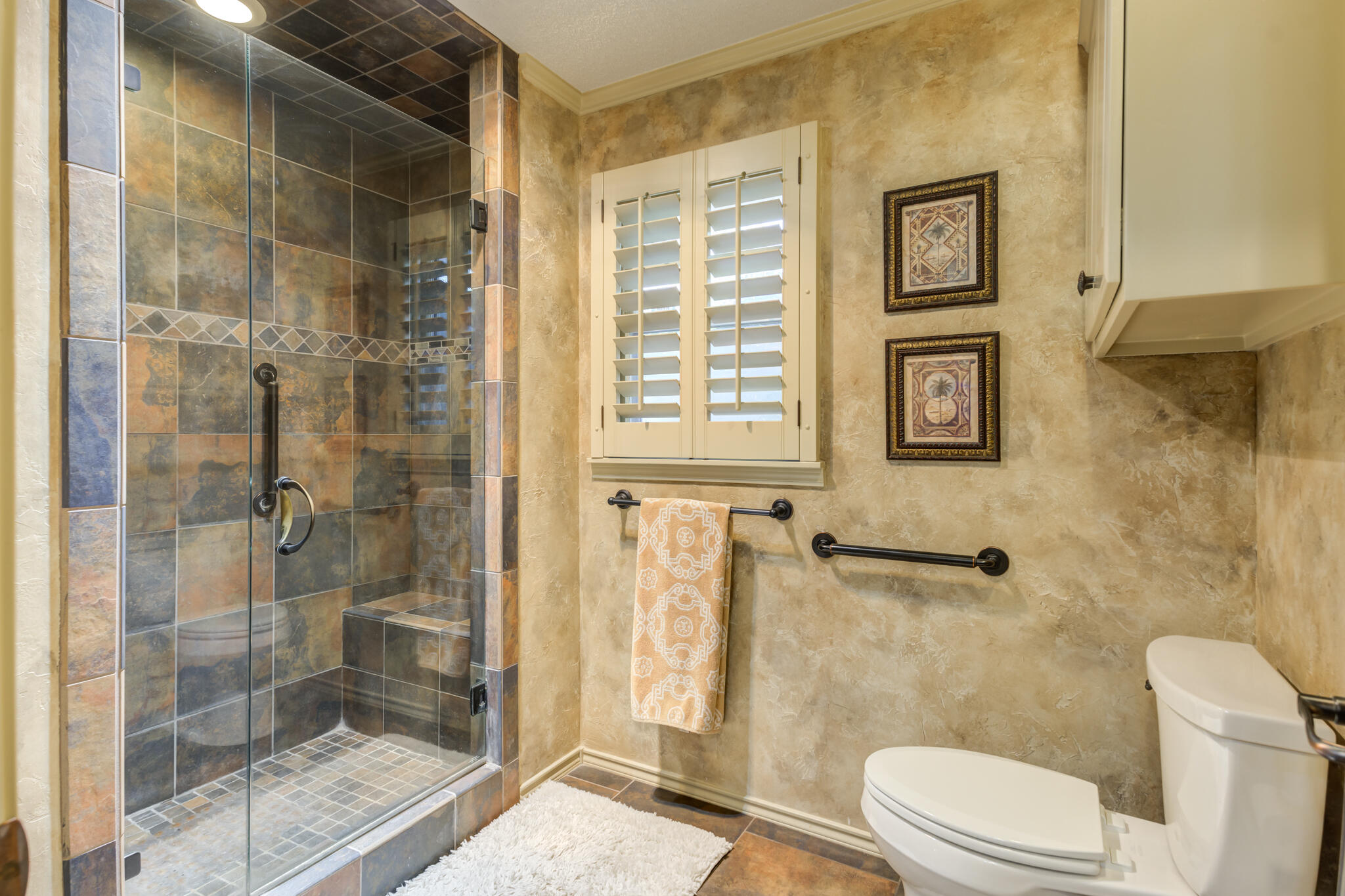 3614 68th Street Lubbock, TX 79413 - Photo 42 of 68 a bathroom with a shower and a toilet