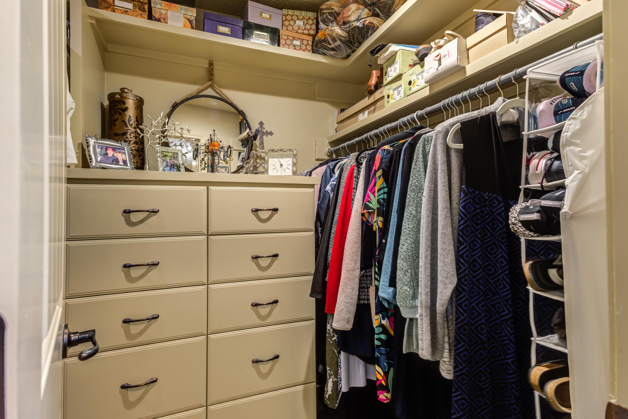 3614 68th Street Lubbock, TX 79413 - Photo 45 of 68 a view of walk in closet with clothes and shoes