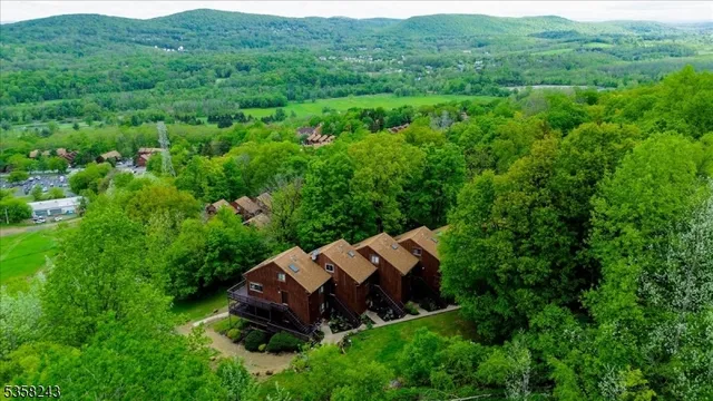 a view of a house with a big yard