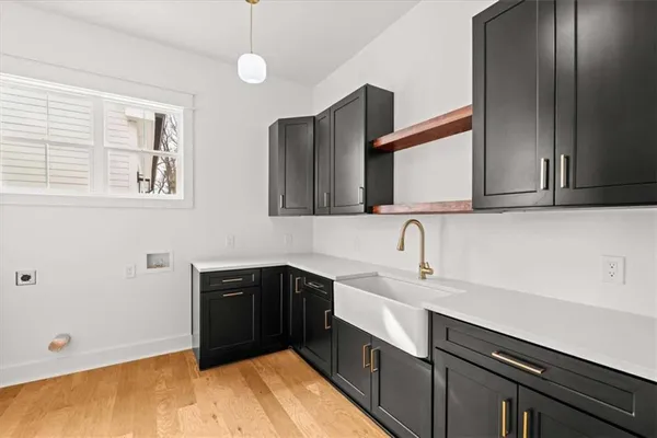 a spacious bathroom with a double vanity sink mirror and