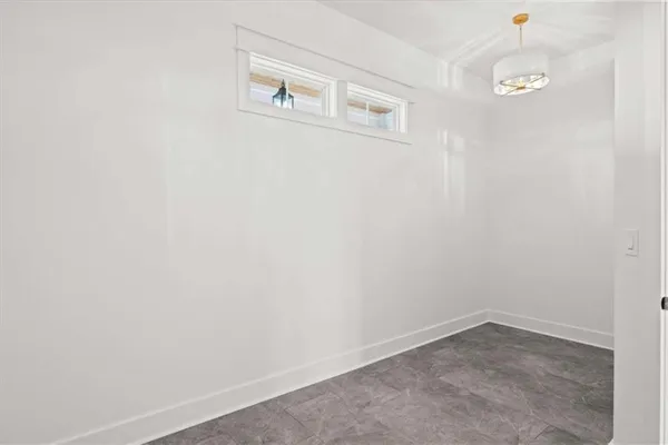 a bathroom with a toilet a sink and a mirror