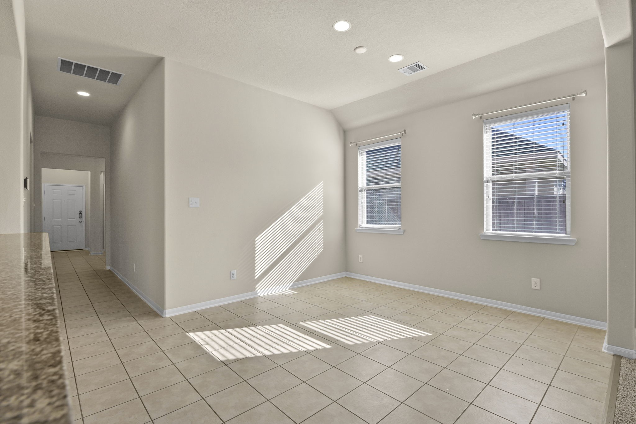 39 Butternut Grove Place Tomball, TX 77375 - Photo 12 of 35 a view of an empty room and window