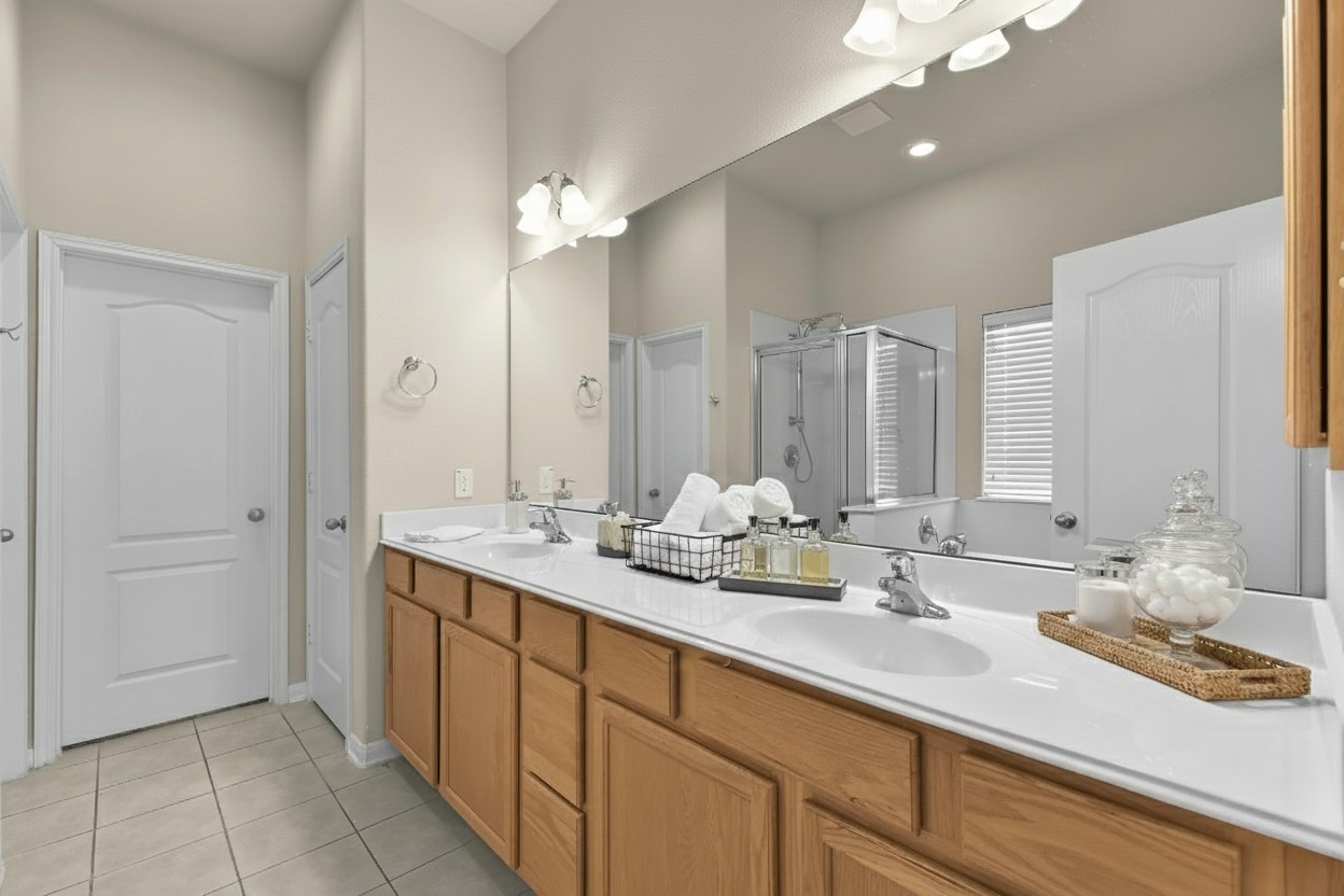 39 Butternut Grove Place Tomball, TX 77375 - Photo 15 of 35 a bathroom with a sink double vanity and a mirror