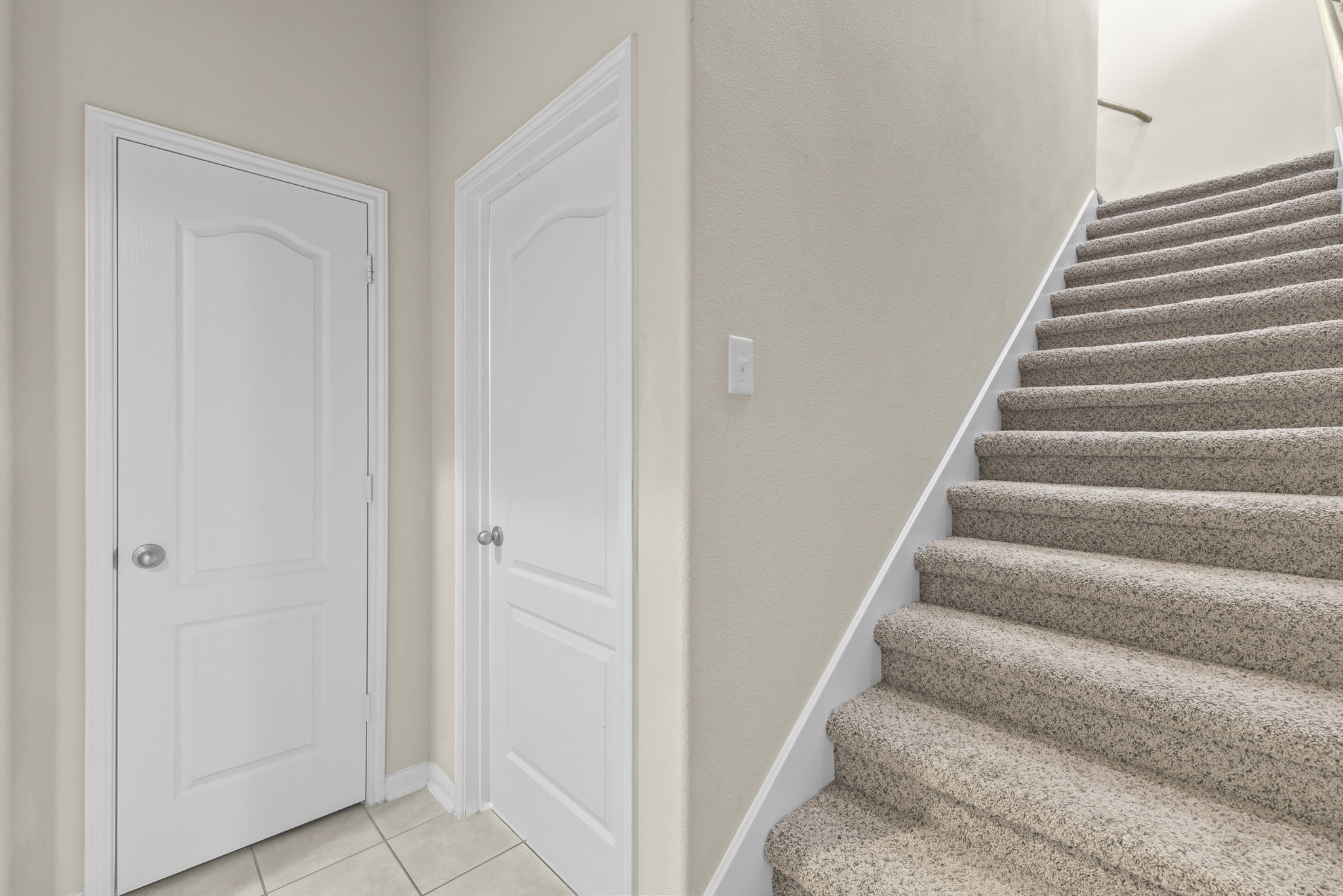 39 Butternut Grove Place Tomball, TX 77375 - Photo 19 of 35 a view of staircase with white walls