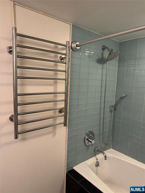 310 Cliff Lane, Unit 4E Cliffside Park, NJ 07010 - Photo 24 of 37 a bathroom with a shower and a sink