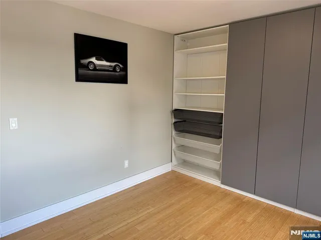 a view of an empty walk in closet