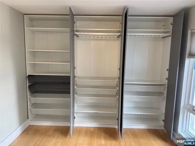 a empty closet with white paint