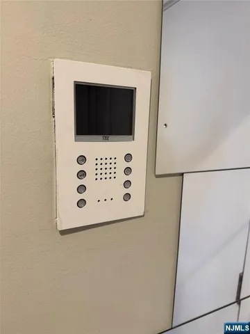 a white wall with a microwave