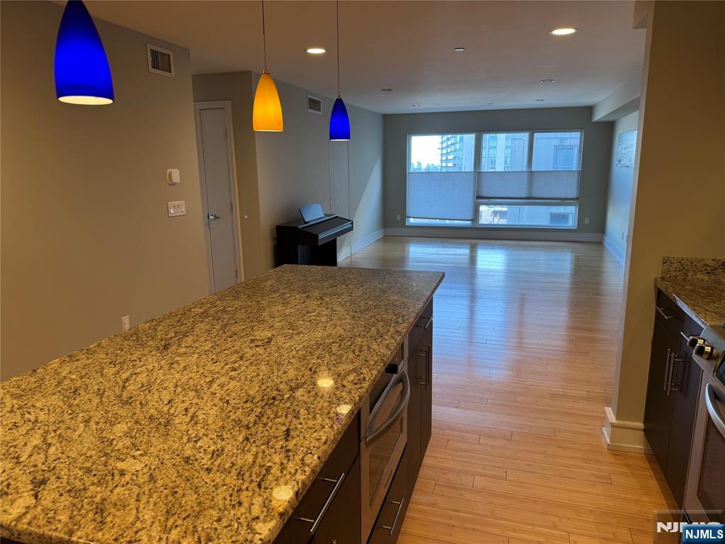 310 Cliff Lane, Unit 4E Cliffside Park, NJ 07010 - Photo 7 of 37 a spacious bathroom with a sink and a mirror
