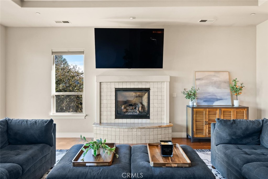 3368 Summit Ridge Terrace Chico, CA 95928 - Photo 15 of 44 a living room with furniture and a fireplace