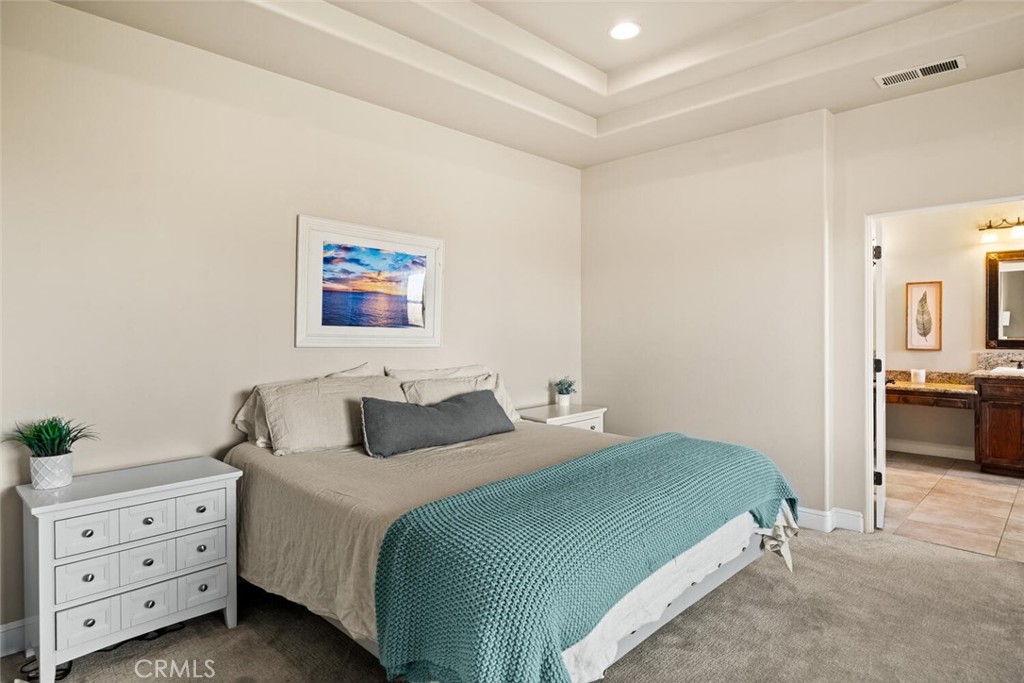 3368 Summit Ridge Terrace Chico, CA 95928 - Photo 18 of 44 a bedroom with a bed and a potted plant