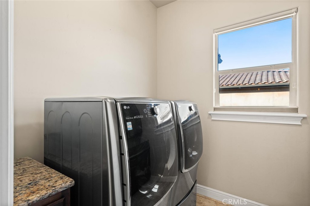 3368 Summit Ridge Terrace Chico, CA 95928 - Photo 31 of 44 a utility room with dryer and washer