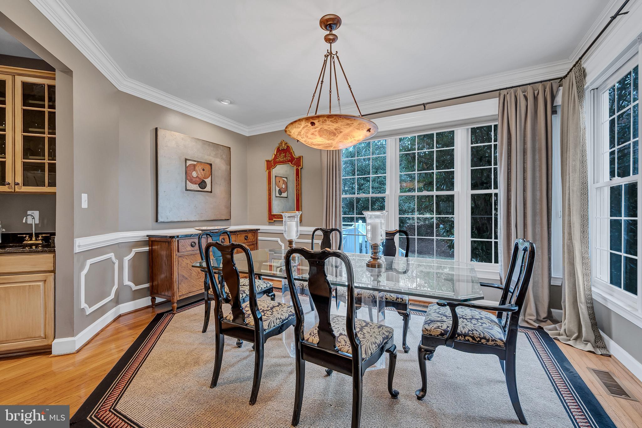 10918 Bells Ridge Drive Potomac, MD 20854 - Photo 12 of 41 a view of a dining room with furniture window and outside view